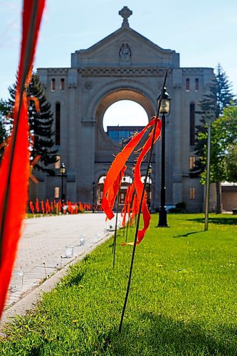 MIKE DEAL / WINNIPEG FREE PRESS
215 orange ribbons line the path to the old St. Boniface Cathedral, a memorial to the 215 children recently found buried in an unmarked gravesite at the former Kamloops Indian Residential School in B.C.
***See Ryan Thorpe story for 49.8 feature
210601 - Tuesday, June 01, 2021.