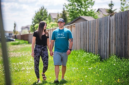 MIKAELA MACKENZIE / WINNIPEG FREE PRESS

Jason and Cynthia Cherewayko, who helped rescue two children at Grand Beach this weekend, pose for a portrait in Winnipeg on Tuesday, June 1, 2021. For Shelley Cook story.
Winnipeg Free Press 2020.