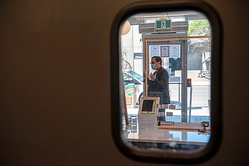 ALEX LUPUL / WINNIPEG FREE PRESS  

Joseph Chaeban, owner of Chaeban Ice Cream, is seen through a doorway in his shop in Winnipeg Tuesday, June 1, 2021. The popular Osborne shop is now expanding into cheesemaking.

Reporter: Eva Wasney