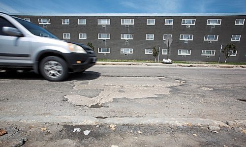 MIKE DEAL / WINNIPEG FREE PRESS
Cars drive through dips and crumbling road on a stretch of Taylor Ave near the Stafford Street intersection.
The votes have been tabulated and the CAA Manitoba Worst Road for 2021 is Taylor Avenue in Winnipeg, making its debut on the Top 10 list due to potholes and crumbling infrastructure. 
Nearly 3000 votes cast in the 2021 CAA Manitoba Worst Roads campaign.
According to Heather Mack, government and community relations manager at CAA Manitoba, Cyclists and pedestrians accounted for 10% of the votes and pointed to potholes, poor cycling infrastructure, and sidewalk obstructions as top concerns.
210602 - Wednesday, June 02, 2021.
