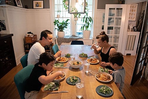 ALEX LUPUL / WINNIPEG FREE PRESS  

Kyle Lew and Kristen Chemerika-Lew, the husband-and-wife team behind the cafe Lark, sit down for a family meal with their two children Charlie and Oliver in their home in Winnipeg Wednesday, June 2, 2021. The homemade family-friendly ricotta meatball dish Kyle and Kristen prepared is a favourite of their children.

Reporter: Eva Wasney