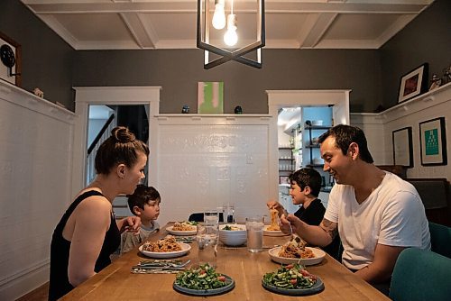 ALEX LUPUL / WINNIPEG FREE PRESS  

Kyle Lew and Kristen Chemerika-Lew, the husband-and-wife team behind the cafe Lark, sit down for a family meal with their two children, Charlie and Oliver, in their home in Winnipeg Wednesday, June 2, 2021. The homemade family-friendly ricotta meatball dish Kyle and Kristen prepared is a favourite of their children.

Reporter: Eva Wasney