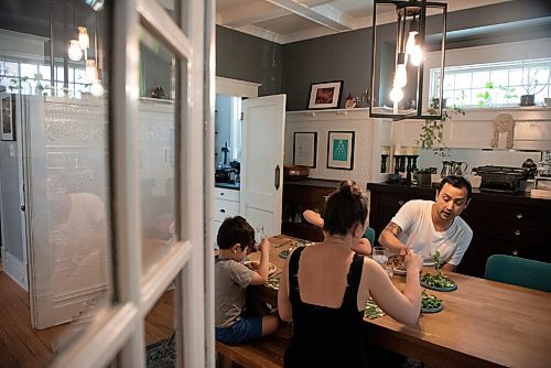 ALEX LUPUL / WINNIPEG FREE PRESS  

Kyle Lew and Kristen Chemerika-Lew, the husband-and-wife team behind the cafe Lark, sit down for a family meal with their two children Charlie and Oliver in their home in Winnipeg Wednesday, June 2, 2021. The homemade family-friendly ricotta meatball dish Kyle and Kristen prepared is a favourite of their children.

Reporter: Eva Wasney