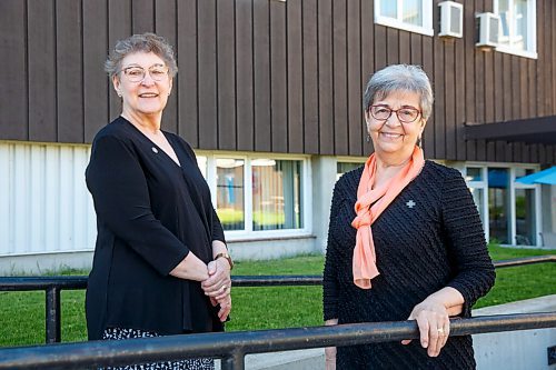 MIKE DEAL / WINNIPEG FREE PRESS
Sisters Mary Coswin (right), Sub-Prioress, and Dorothy Levandosky (left), administration, outside the old layperson residence that will be the new residence for the Sisters of St. Benedict.
Sisters of St. Benedict are selling their property just north of Winnipeg for a health and wellness clinic run by South East Resource Development Council, ending decades of hospitality at their retreat centre.
See Brenda Suderman story
210603 - Thursday, June 03, 2021.