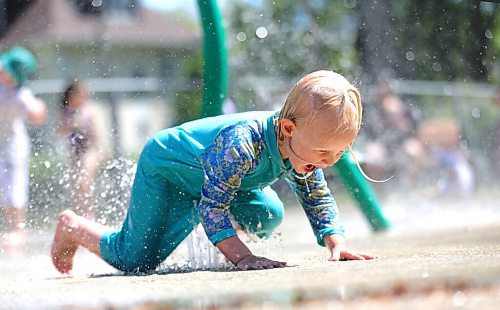 RUTH BONNEVILLE / WINNIPEG FREE PRESS

Local - Splash Pads open in City

Ivy Van Niekerk (3yrs), screams with glee as she cools herself in the spray at Vimy Ridge Memorial Park Splash Pad on Thursday.  Her grandmother brought Ivy to the park after hearing they opened at noon on Thursday. 

June 03, 2021

