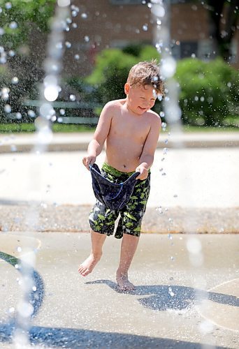 RUTH BONNEVILLE / WINNIPEG FREE PRESS


Local - Splash Pads open in City


Micah Depape (4yrs), fills his sun hat with water while playing at the Vimy Ridge Memorial Park Splash Pad while his granddad, Don  McBain, watching him  on Thursday. 




June 03, 2021