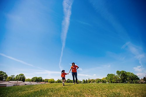 MIKAELA MACKENZIE / WINNIPEG FREE PRESS

Erica Daniels, who directed the newly-released eight-part series documenting the Seven Sacred Teachings, poses for a portrait with her daughter, Serenity (three), at Braeside Park in Winnipeg on Thursday, June 3, 2021. For Ben Waldman story.
Winnipeg Free Press 2021.