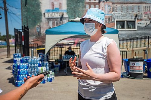 MIKAELA MACKENZIE / WINNIPEG FREE PRESS

Karen Murison speaks to the Free Press at a station offering free water, snacks, and cooling mist at the Main Street Project in Winnipeg on Friday, June 4, 2021. For Cody Sellar story.
Winnipeg Free Press 2021.