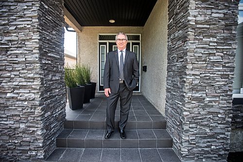 MIKAELA MACKENZIE / WINNIPEG FREE PRESS

MREA president Stewart Elston poses for a portrait in front of his house in Winnipeg on Friday, June 4, 2021. More people than ever are trying to become realtors in this hot housing market. For Ben Waldman story.
Winnipeg Free Press 2021.