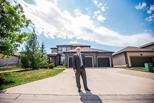 MIKAELA MACKENZIE / WINNIPEG FREE PRESS

MREA president Stewart Elston poses for a portrait in front of his house in Winnipeg on Friday, June 4, 2021. More people than ever are trying to become realtors in this hot housing market. For Ben Waldman story.
Winnipeg Free Press 2021.