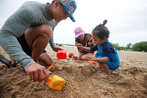 JOHN WOODS / WINNIPEG FREE PRESS
Alaina and Choisan Gajsan and their two year old Xian were out enjoying the beach at Birds Hill Park Sunday, June 6, 2021. Saturday was busy but the wind on Sunday sent some home early.

Reporter: Danielle