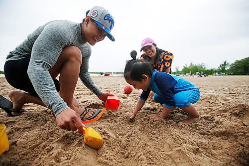 JOHN WOODS / WINNIPEG FREE PRESS
Alaina and Choisan Gajsan and their two year old Xian were out enjoying the beach at Birds Hill Park Sunday, June 6, 2021. Saturday was busy but the wind on Sunday sent some home early.

Reporter: Danielle