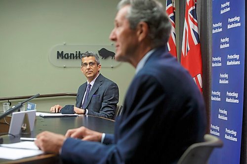 MIKE DEAL / WINNIPEG FREE PRESS
Premier Brian Pallister and Manny Atwal, president and CEO, Manitoba Liquor and Lotteries, during a vaccine incentive announcement Wednesday morning. The province will be offering nearly $2 million in cash and scholarships to encourage more Manitobans to get the shot this summer.
210609 - Wednesday, June 09, 2021.