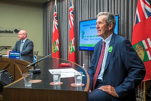 MIKAELA MACKENZIE / WINNIPEG FREE PRESS

Premier Brian Pallister (right) and Dr. Brent Roussin, chief provincial public health officer, outline the summer reopening plan at the Manitoba Legislative Building in Winnipeg on Thursday, June 10, 2021. For Danielle story.
Winnipeg Free Press 2021.