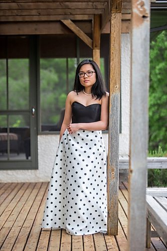 MIKAELA MACKENZIE / WINNIPEG FREE PRESS

SJR student Lauren McIlroy poses for a portrait (in one of the two dresses that she was excited to wear to grad events that have been cancelled) at her home in La Salle on Thursday, June 10, 2021. For Jen story.
Winnipeg Free Press 2021.