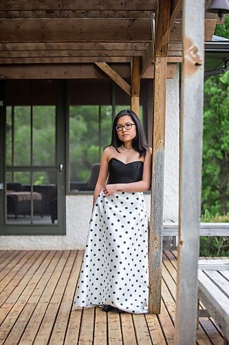 MIKAELA MACKENZIE / WINNIPEG FREE PRESS

SJR student Lauren McIlroy poses for a portrait (in one of the two dresses that she was excited to wear to grad events that have been cancelled) at her home in La Salle on Thursday, June 10, 2021. For Jen story.
Winnipeg Free Press 2021.