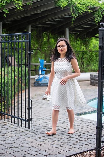 MIKAELA MACKENZIE / WINNIPEG FREE PRESS

SJR student Lauren McIlroy poses for a portrait (in one of the two dresses that she was excited to wear to grad events that have been cancelled) at her home in La Salle on Thursday, June 10, 2021. For Jen story.
Winnipeg Free Press 2021.