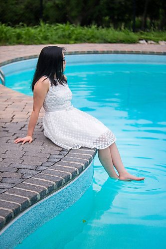 MIKAELA MACKENZIE / WINNIPEG FREE PRESS

SJR student Lauren McIlroy poses for a portrait (in one of the two dresses that she was excited to wear to grad events that have been cancelled) at her home in La Salle on Thursday, June 10, 2021. For Jen story.
Winnipeg Free Press 2021.