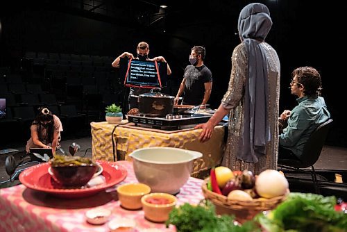 ALEX LUPUL / WINNIPEG FREE PRESS  

Hazel Venzon, Montaser Al Jaheh, Charles Venzon, Suzan Palani and Amin Montazeri are  photographed during rehearsals at the RMTC Warehouse in Winnipeg on Thursday, June 10, 2021. Embrace is a theatre show that attempts to connect audiences with immigrant experiences through food. The cast includes individuals from Jordan, Kurdistan and Syria, who will be telling their stories of immigration while showing viewers how to make a special dish from their home country.

Reporter: Eva Wasney