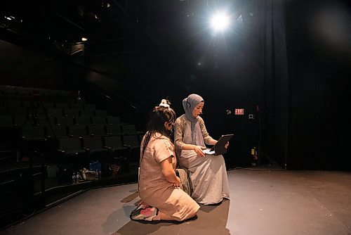 ALEX LUPUL / WINNIPEG FREE PRESS  

Creator/Director/Producer Hazel Venzon, and Featured Aritst Suzan Palani run through lines together during rehearsals at the RMTC Warehouse in Winnipeg on Thursday, June 10, 2021. Embrace is a theatre show that attempts to connect audiences with immigrant experiences through food. The cast includes individuals from Jordan, Kurdistan and Syria, who will be telling their stories of immigration while showing viewers how to make a special dish from their home country.

Reporter: Eva Wasney