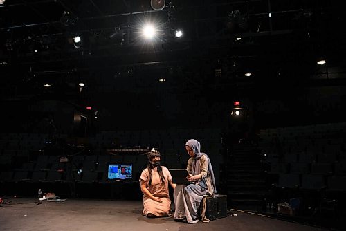 ALEX LUPUL / WINNIPEG FREE PRESS  

Creator/Director/Producer Hazel Venzon, and Featured Aritst Suzan Palani run through lines together during rehearsals at the RMTC Warehouse in Winnipeg on Thursday, June 10, 2021. Embrace is a theatre show that attempts to connect audiences with immigrant experiences through food. The cast includes individuals from Jordan, Kurdistan and Syria, who will be telling their stories of immigration while showing viewers how to make a special dish from their home country.

Reporter: Eva Wasney