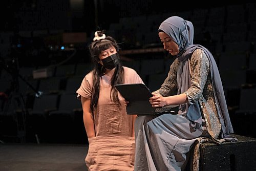 ALEX LUPUL / WINNIPEG FREE PRESS  

Creator/Director/Producer Hazel Venzon, and Featured Aritst Suzan Palani run through lines together during rehearsals at the RMTC Warehouse in Winnipeg on Thursday, June 10, 2021. Embrace is a theatre show that attempts to connect audiences with immigrant experiences through food. The cast includes individuals from Jordan, Kurdistan and Syria, who will be telling their stories of immigration while showing viewers how to make a special dish from their home country.

Reporter: Eva Wasney