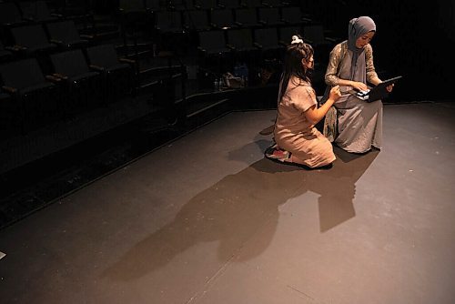 ALEX LUPUL / WINNIPEG FREE PRESS  

Creator/Director/Producer Hazel Venzon, and Featured Aritst Suzan Palani run through lines together during rehearsals at the RMTC Warehouse in Winnipeg on Thursday, June 10, 2021. Embrace is a theatre show that attempts to connect audiences with immigrant experiences through food. The cast includes individuals from Jordan, Kurdistan and Syria, who will be telling their stories of immigration while showing viewers how to make a special dish from their home country.

Reporter: Eva Wasney