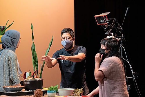 ALEX LUPUL / WINNIPEG FREE PRESS  

Featured Artist Suzan Palani, Director of Photography Charles Venzon, and Creator Hazel Venzon are photographed during rehearsals at the RMTC Warehouse in Winnipeg on Thursday, June 10, 2021. Embrace is a theatre show that attempts to connect audiences with immigrant experiences through food. The cast includes individuals from Jordan, Kurdistan and Syria, who will be telling their stories of immigration while showing viewers how to make a special dish from their home country.

Reporter: Eva Wasney