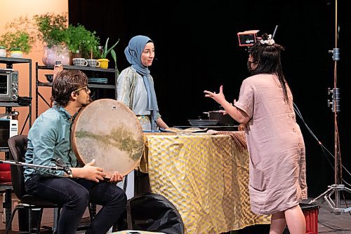 ALEX LUPUL / WINNIPEG FREE PRESS  

Musician Amin Montazeri, featured artist Suzan Palani and creator Hazel Venzon are photographed during rehearsals at the RMTC Warehouse in Winnipeg on Thursday, June 10, 2021. Embrace is a theatre show that attempts to connect audiences with immigrant experiences through food. The cast includes individuals from Jordan, Kurdistan and Syria, who will be telling their stories of immigration while showing viewers how to make a special dish from their home country.

Reporter: Eva Wasney