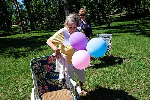 Daniel Crump / Winnipeg Free Press. Tela Karadin has waited weeks to celebrate her 82 birthday together with a few friends. The small group met at Kildonan Park on Saturday afternoon. June 12, 2021.