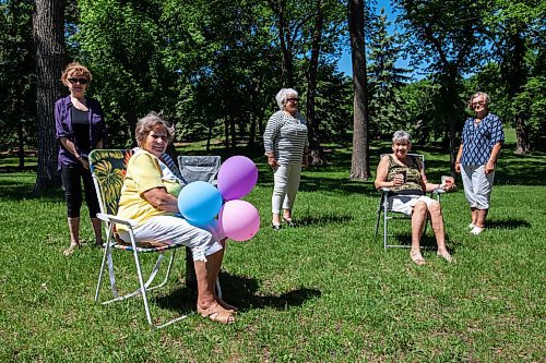 Daniel Crump / Winnipeg Free Press. Tela Karadin has waited weeks to celebrate her 82 birthday together with a few friends. The small group met at Kildonan Park on Saturday afternoon. June 12, 2021.