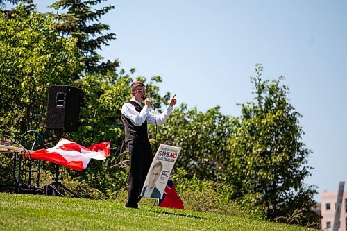 Daniel Crump / Winnipeg Free Press. A man from the church of god restoration speaks at an anti-restriction rally at the forks on Saturday afternoon. June 12, 2021.