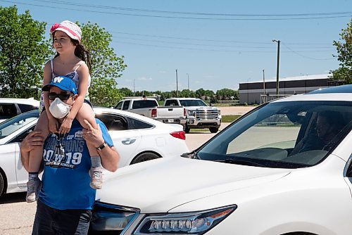 ALEX LUPUL / WINNIPEG FREE PRESS  

Attendees enjoy the Winnipeg International Children's Festival from the comfort of their vehicles at the Red River Exhibition Park on Sunday, June 13, 2021. Due to ongoing restrictions, the format has shifted to a drive-in format.