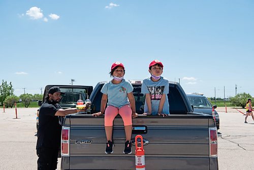 ALEX LUPUL / WINNIPEG FREE PRESS  

Attendees enjoy the Winnipeg International Children's Festival from the comfort of their vehicles at the Red River Exhibition Park on Sunday, June 13, 2021. Due to ongoing restrictions, the format has shifted to a drive-in format.