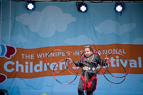 ALEX LUPUL / WINNIPEG FREE PRESS  

The Summer Bear Dance Troupe performs a hoop dance at the Winnipeg International Children's Festival at the Red River Exhibition Park on Sunday, June 13, 2021. Due to ongoing restrictions, the format has shifted to a drive-in format.