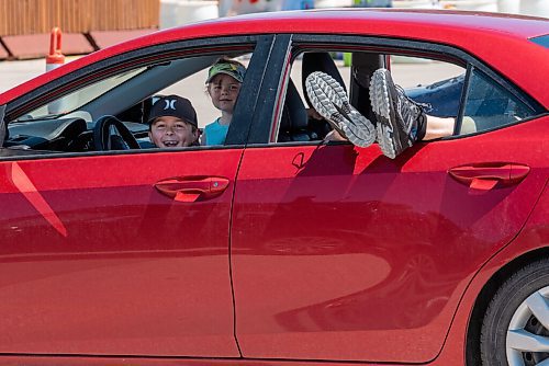 ALEX LUPUL / WINNIPEG FREE PRESS  

Attendees enjoy the Winnipeg International Children's Festival from the comfort of their vehicles at the Red River Exhibition Park on Sunday, June 13, 2021. Due to ongoing restrictions, the format has shifted to a drive-in format.