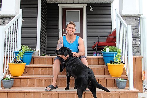 Canstar Community News Cory Bader takes a picture with his dog Polly at his La Salle home on June 8. Bader has spoken openly about his past with addiction, and how the pandemic can negatively affect people's sobriety. (PHOTO BY GABRIELLE PICHÉ/CANSTAR COMMUNITY NEWS/HEADLINER)