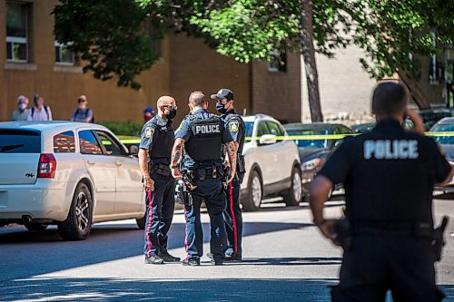 MIKAELA MACKENZIE / WINNIPEG FREE PRESS

Police investigate the scene of a shooting at Young and Westminster in Winnipeg on Monday, June 14, 2021. For Malak story.
Winnipeg Free Press 2021.