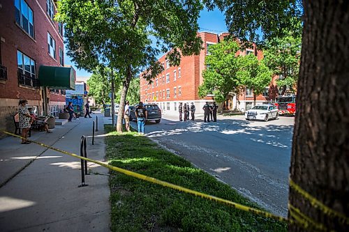 MIKAELA MACKENZIE / WINNIPEG FREE PRESS

Police investigate the scene of a shooting at Young and Westminster in Winnipeg on Monday, June 14, 2021. For Malak story.
Winnipeg Free Press 2021.