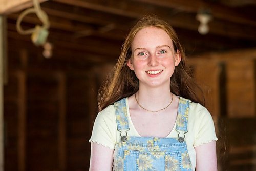 MIKAELA MACKENZIE / WINNIPEG FREE PRESS

Jessica Walker, who created and runs Little Red Barn Micro Sanctuary, poses for a portrait with her 800 saved chickens in Charleswood on Monday, June 14, 2021. Jessica rescues a variety of animals, including pigs, chickens, goats, sheep, cows and horses. She also gives tours to people of all ages in an effort to educate them about -- and give them a better appreciation for -- these animals. For Aaron Epp story.
Winnipeg Free Press 2021.