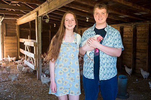 MIKAELA MACKENZIE / WINNIPEG FREE PRESS

Jessica Walker, who created and runs Little Red Barn Micro Sanctuary, poses for a portrait with her brother, Ryan, and their chickens in Charleswood on Monday, June 14, 2021. Jessica rescues a variety of animals, including pigs, chickens, goats, sheep, cows and horses. She also gives tours to people of all ages in an effort to educate them about -- and give them a better appreciation for -- these animals. For Aaron Epp story.
Winnipeg Free Press 2021.