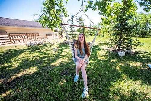 MIKAELA MACKENZIE / WINNIPEG FREE PRESS

Jessica Walker, who created and runs Little Red Barn Micro Sanctuary, poses for a portrait with her 800 saved chickens in Charleswood on Monday, June 14, 2021. Jessica rescues a variety of animals, including pigs, chickens, goats, sheep, cows and horses. She also gives tours to people of all ages in an effort to educate them about -- and give them a better appreciation for -- these animals. For Aaron Epp story.
Winnipeg Free Press 2021.