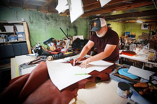 JOHN WOODS / WINNIPEG FREE PRESS
Chuck Allen, owner of Earth & Hide, a home-based pottery and leather works business, is photographed as he works on his product Monday, June 14, 2021. 

Reporter: Sanderson