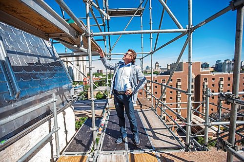 MIKAELA MACKENZIE / WINNIPEG FREE PRESS

Karl Loepp, COO and co-founder of Private Pension Partners, shows the Free Press around the work being done on the Augustine Centre up on the scaffolding by the steeple in Winnipeg on Tuesday, June 15, 2021. For Melissa Martin story.
Winnipeg Free Press 2021.