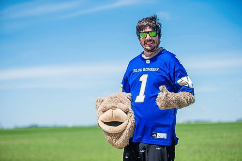 MIKAELA MACKENZIE / WINNIPEG FREE PRESS

Sean Schmatkow, aka Bomber Fan Ted, poses for a portrait in his fan gear at his home in Ste. Anne on Tuesday, June 15, 2021. For Taylor story.
Winnipeg Free Press 2021.