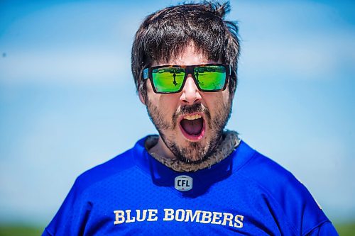 MIKAELA MACKENZIE / WINNIPEG FREE PRESS

Sean Schmatkow, aka Bomber Fan Ted, poses for a portrait in his fan gear at his home in Ste. Anne on Tuesday, June 15, 2021. For Taylor story.
Winnipeg Free Press 2021.