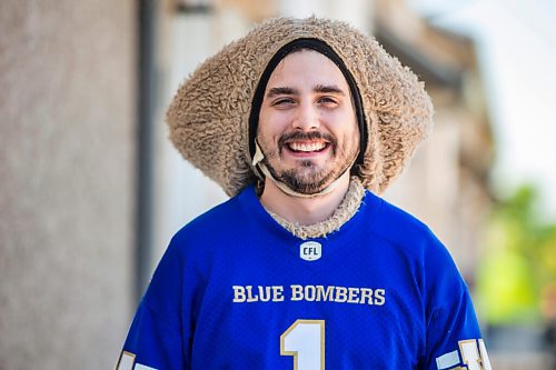 MIKAELA MACKENZIE / WINNIPEG FREE PRESS

Sean Schmatkow, aka Bomber Fan Ted, poses for a portrait in his fan gear at his home in Ste. Anne on Tuesday, June 15, 2021. For Taylor story.
Winnipeg Free Press 2021.