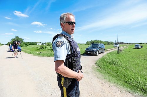 RUTH BONNEVILLE / WINNIPEG FREE PRESS

Local - Wildman, Wanted Man 

RCMP Sgt. Paul Manaigne, stands at the end of Eric Paul Wildman's property near the RM of St. Clements as investigators look for evidence of Wildman's connection with the possible hiomicide of missing man, Clifford Joseph who was his neighbour. Clifford Joseph's property backed onto Wildman's property and can be seen in the photo. (White buildings to the left of the officer).

 On Wildman's property can be seen multiple burned out vehicles from a fire that occurred about a month ago which burned down the home on the property.  

See Malak's story 


June 15,, 2021

