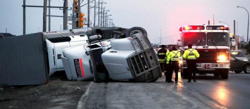 BORIS.MINKEVICH@FREEPRESS.MB.CA  100318 BORIS MINKEVICH / WINNIPEG FREE PRESS A semi flipped over on Lagimodiere near Bishop Grandon Blvd.