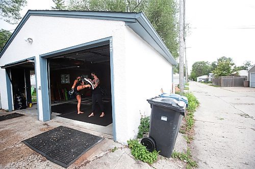 JOHN WOODS / WINNIPEG FREE PRESS
Ashley Viner, left, Muay Thai athlete who is ranked first in the Canadian welterweight division, trains with her cousin and coach, 2-time Canadian champion Trisha Sammons in Sammons garage Wednesday, June 16, 2021. 

Reporter: Katz